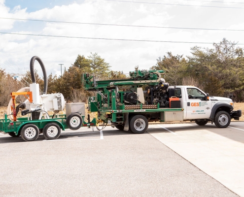 Vacuum truck and drilling rig for environmental drilling