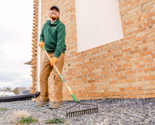 environmental consulting technician finishing an oil tank abandonment at a residential property after an environmental site assessment